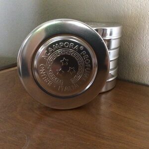 4 Empty round metal containers, Bruno Acampora Profumi Italia